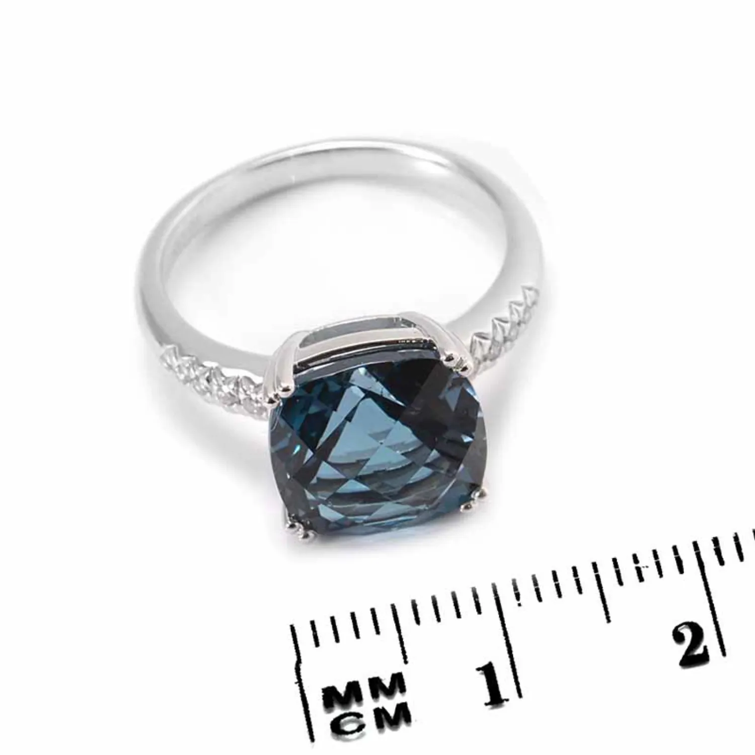 18k white gold ring with topaz in Colors of the Sky theme.