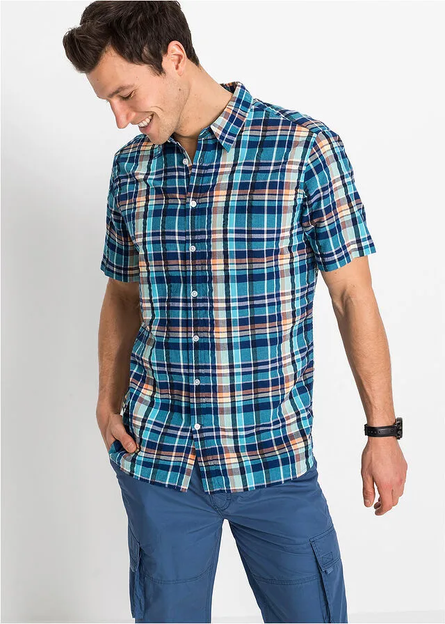 Comfortable fit short-sleeve thousand stripes blue checkered shirt.