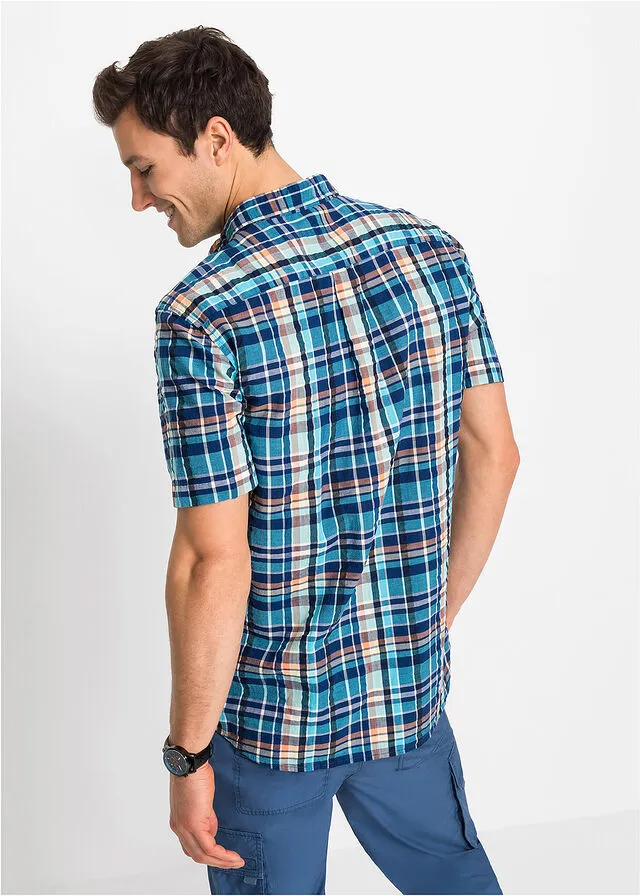 Comfortable fit short-sleeve thousand stripes blue checkered shirt.