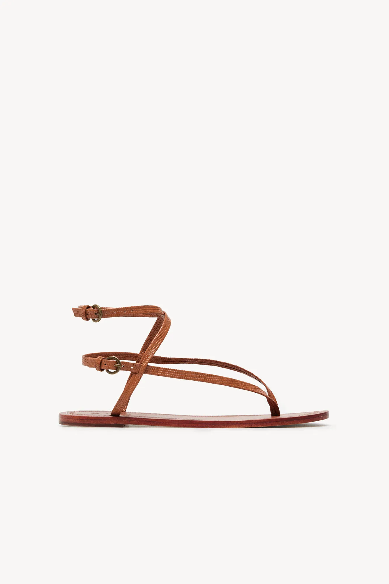 Maisa Flat Leather Sandals with Embossed Design.