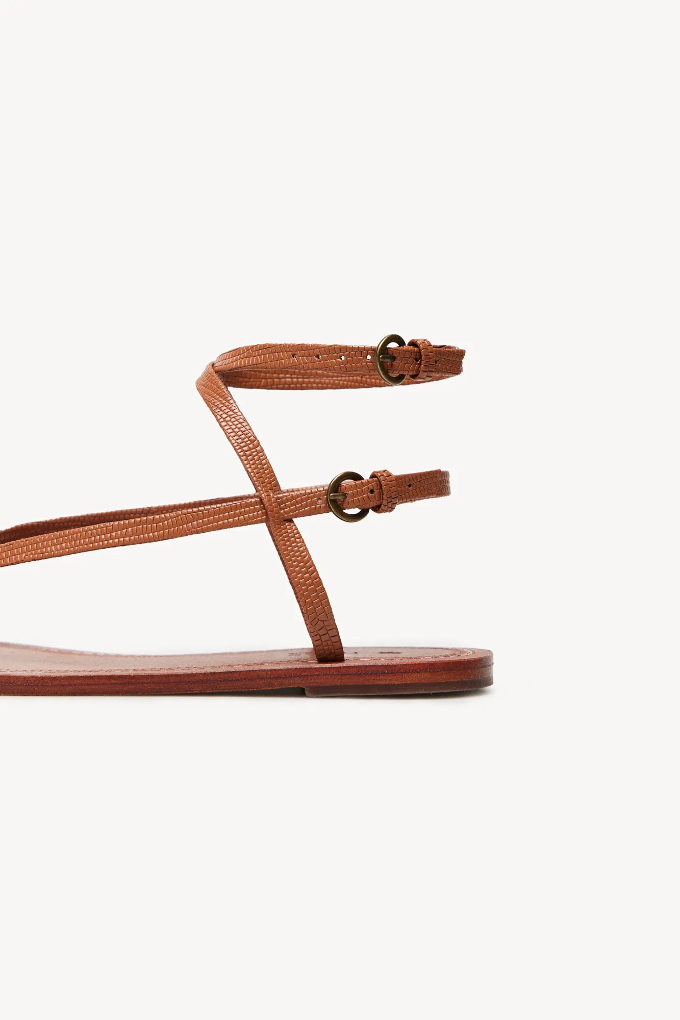 Maisa Flat Leather Sandals with Embossed Design.